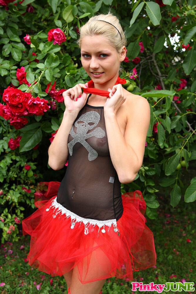 Cute blonde teen Buffy hikes up a tutu before masturbating in the back yard - #13