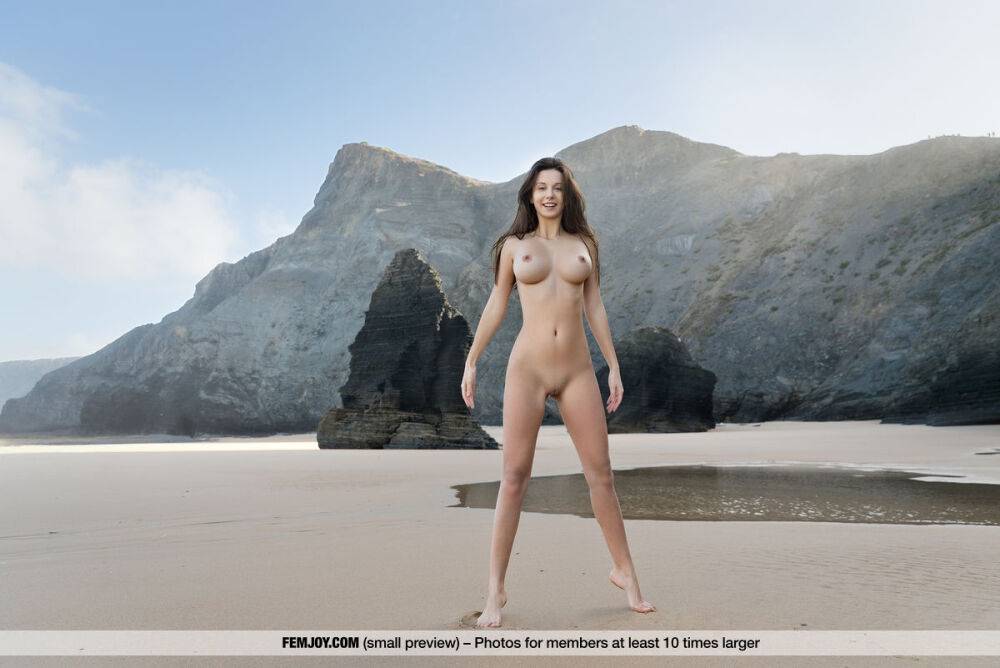 Beautiful brunette Alisa I shows off her great tits during nude poses on beach - #10