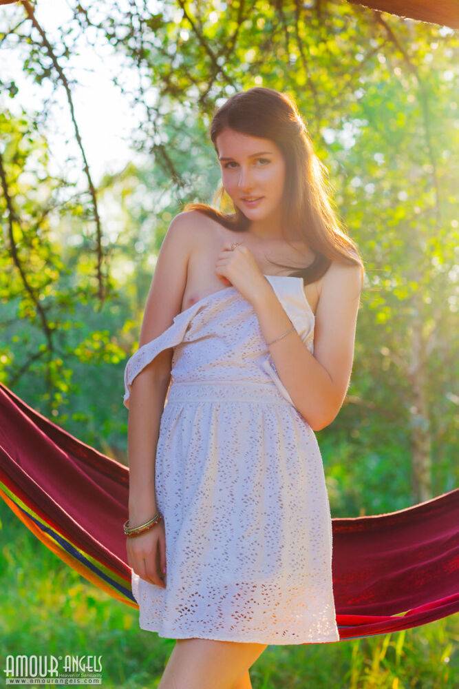 Sweet teen Alisa shows her perfect pussy outdoors on a hammock - #11