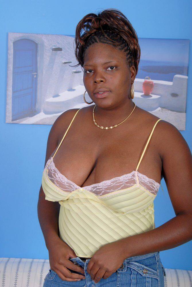 Thick ebony chick places hands over her exposed big naturals - #16