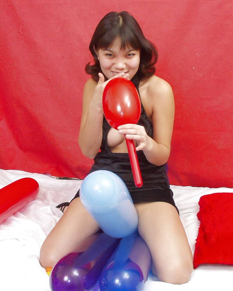 Naughty thai girl in sexy dress playing with a big red balloon - #16