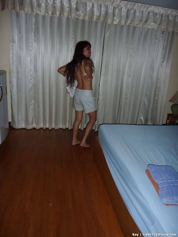 Naughty asian babe with slender legs stripping off her clothes - #8