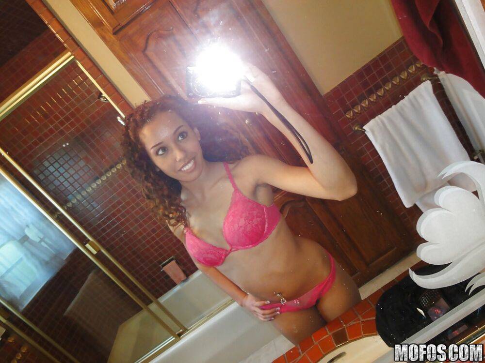 Curly-haired latina slipping off her pink lingerie and making selfies - #5