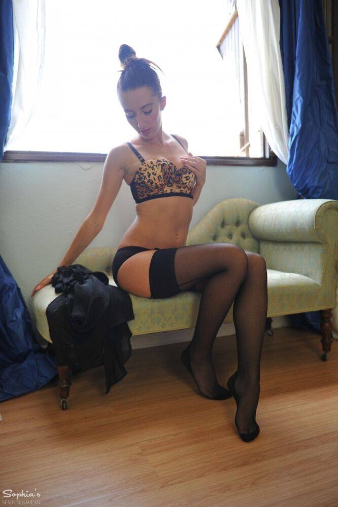 Solo model Sophia Smith strips to her black stockings with her hair up - #8