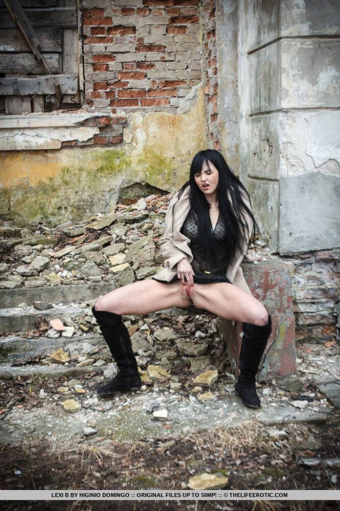 Horny teen Lexi B fingers her pussy behind an old building in a coat and boots - #14