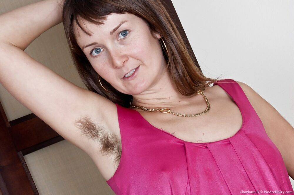 Lusty mature babe exposing her unshaven armpits and shaggy cunt - #9