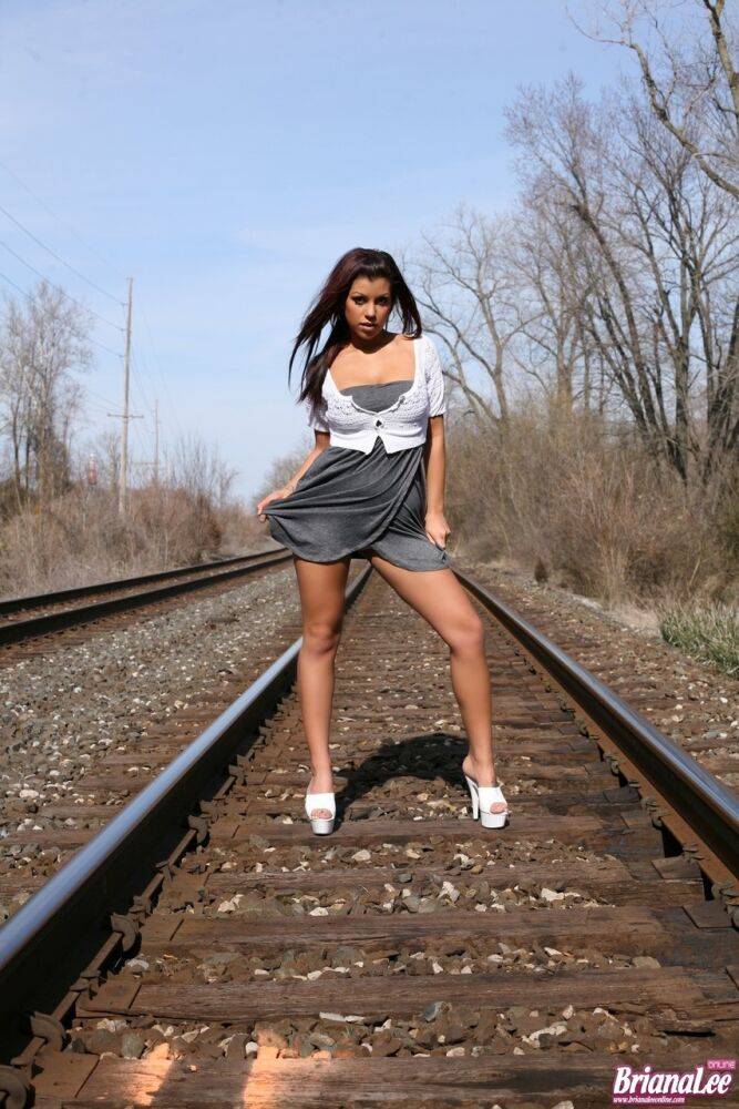 Amateur chick Briana Lee flashes her bare upskirt ass on train tracks - #7