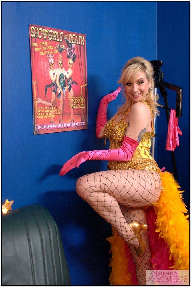 Flexible college girl Karina Kay posing in fishnet pantyhose and corset - #7