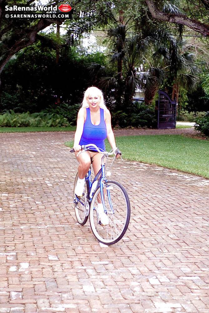 Older pornstar SaRenna Lee revealing monster tits outdoors on bicycle - #7