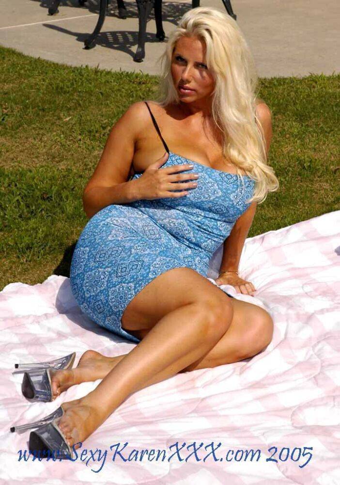 Busty blonde Karen Fisher rubs her bald pussy with a bottle of soda outdoors - #10