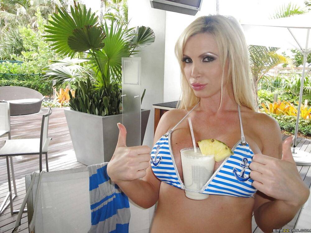 Glamorous babe Nikki Benz in bikini shows her tits outdoor - #9