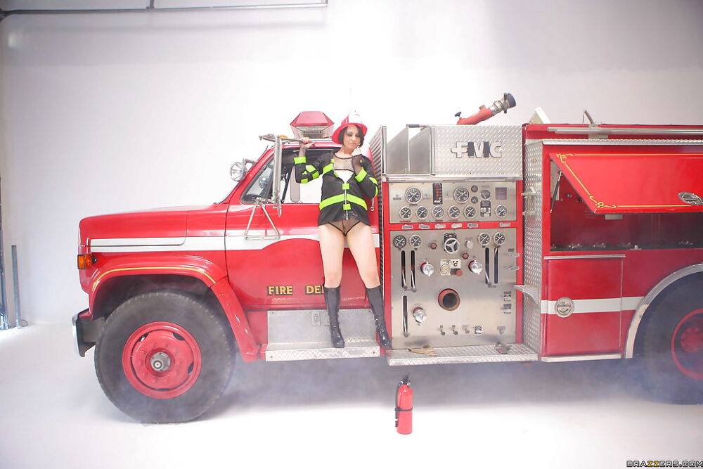 Hot Sarah Shevon is posing in panties and in firefighter's uniform - #2