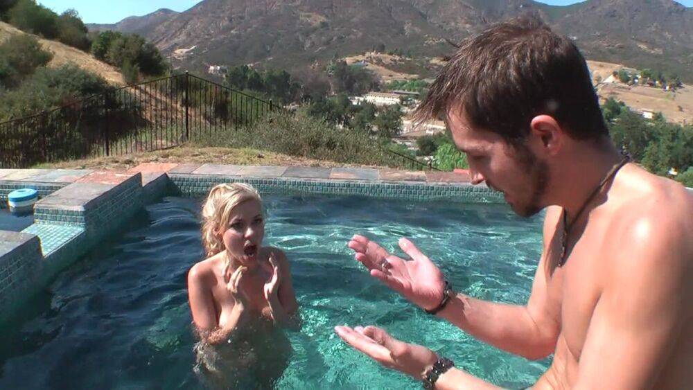 Young looking blonde Nicole Ray has sex on the side of a lakeside pool - #15