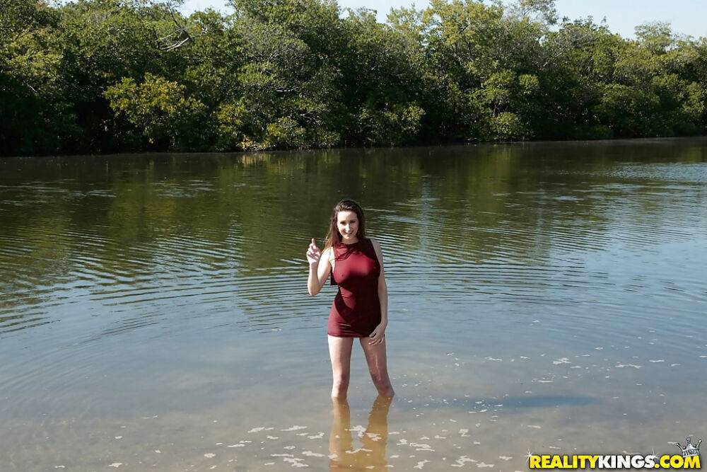 Busty teen chick Ashley Adams masturbating fully clothed beside lake - #10