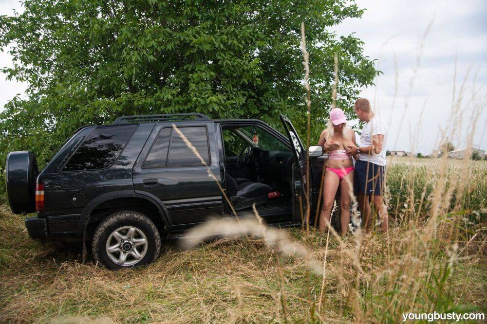 Bleach blonde slut gives her man a saggy titjob outdoors on an off road trip - #11