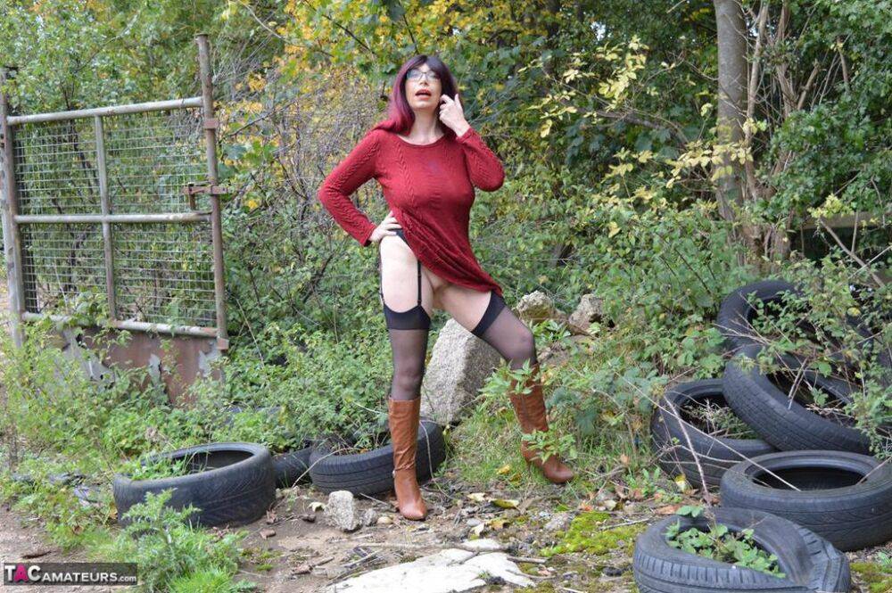 Horny mature Barby spreads ass in stockings & boots in naked outdoor upskirt - #9