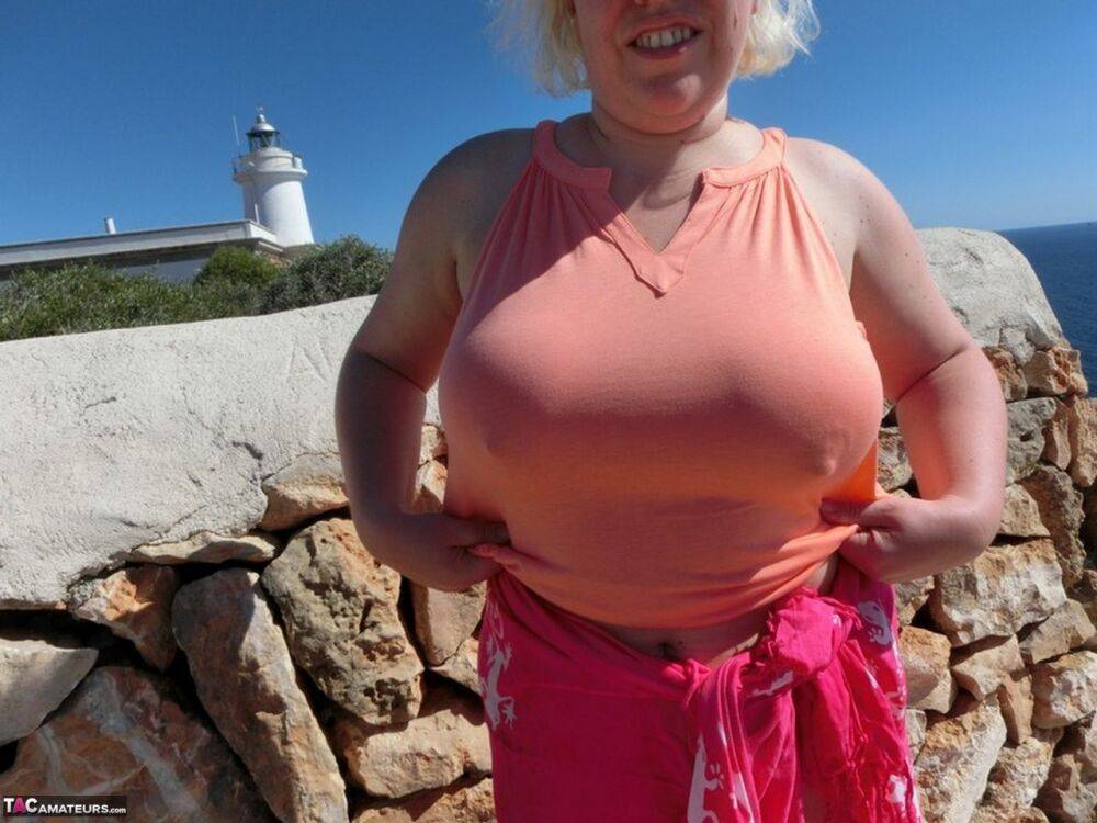 Mature plumper Barby gets naked while visiting a Spanish tourist site - #3