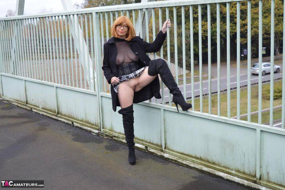 Mature redhead Barby Slut exposes herself in public while wearing OTK boots - #1