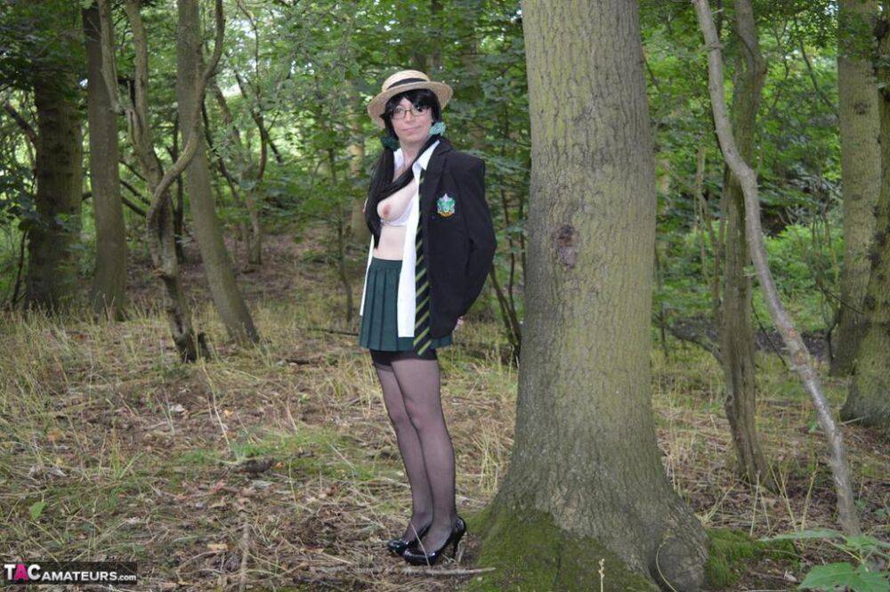 Older amateur Barby Slut exposes herself in the woods in schoolgirl apparel - #6