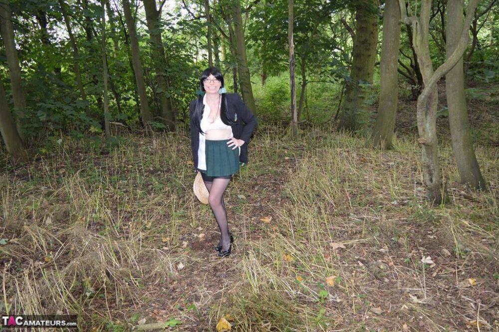 Older amateur Barby Slut exposes herself in the woods in schoolgirl apparel - #16