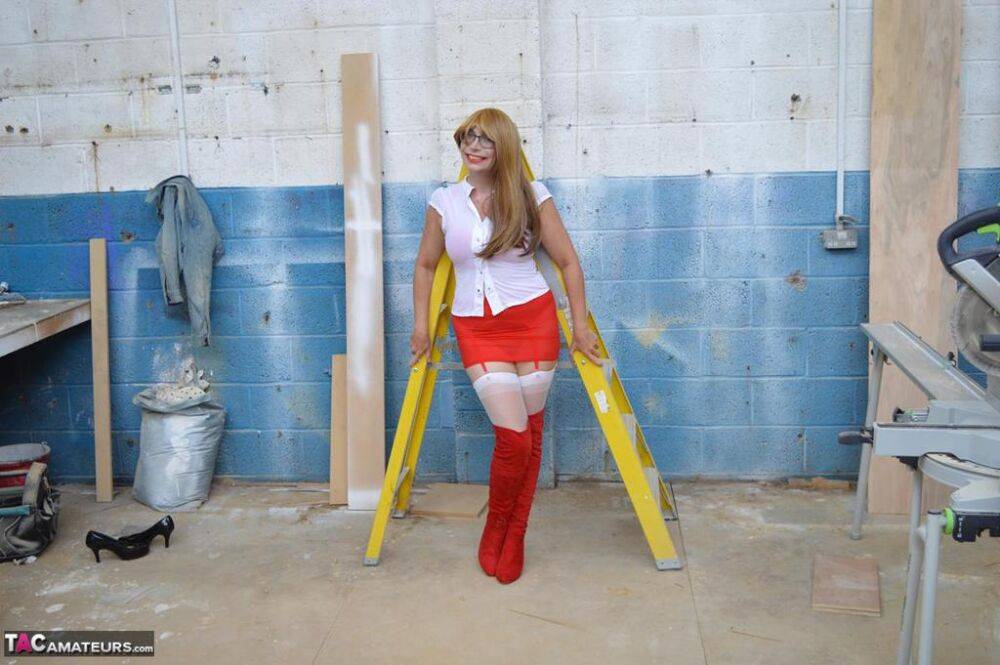 Middle-aged woman Barby Slut gets naked at a job site in OTK boots & nylons - #14