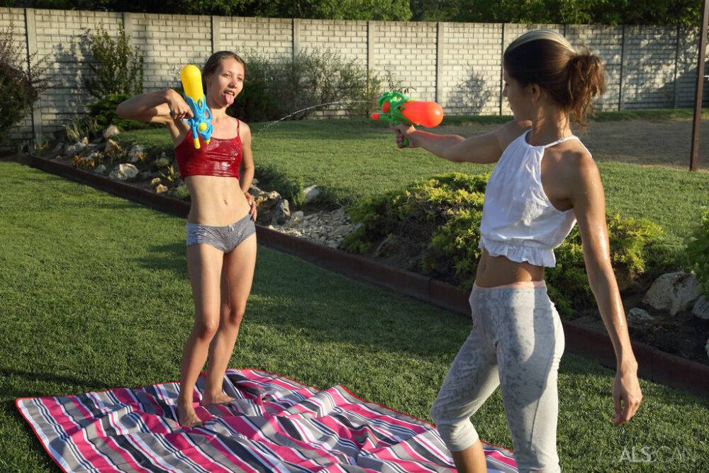Lesbian teens Gina Gerson & Stefanie Moon fuck with a strapon in the backyard - #16