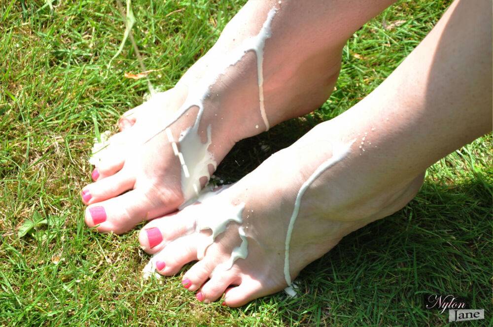 British woman Piage Turnah licks and sucks her own toes on the lawn - #13