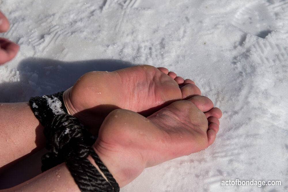 Brunette BBW rids ball gag and ropes while posing nude and barefoot in snow - #1