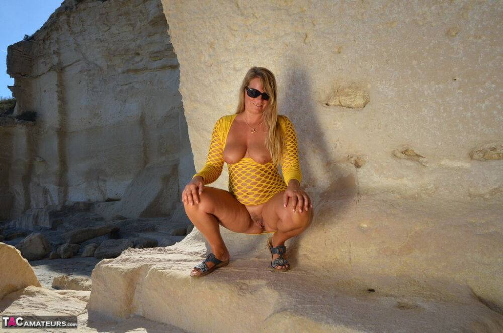 Over 30 blonde Sweet Susi exposes herself in arid conditions while in shades - #9
