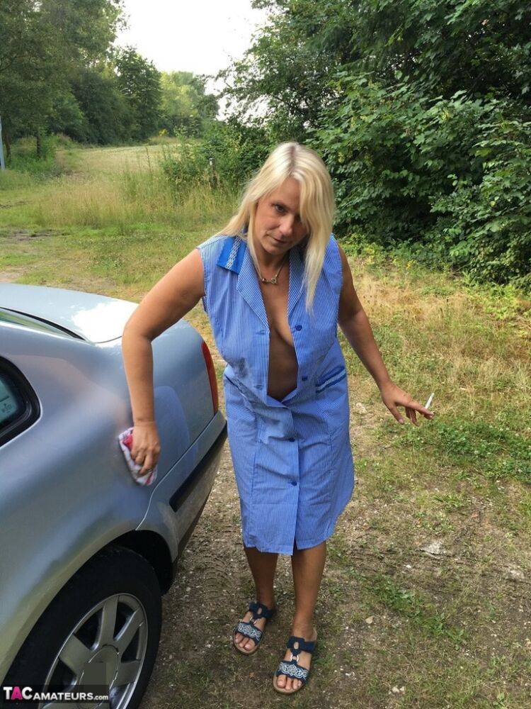 Smoking mature mom Sweet Susi opens her dress to pinch hard nipples outdoors - #12