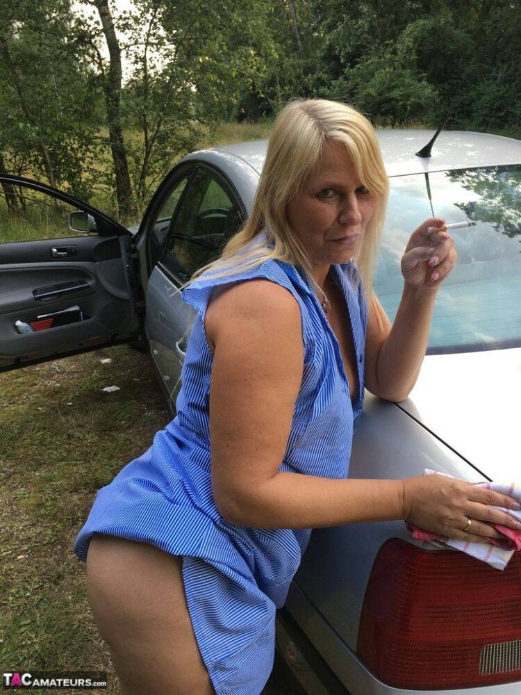 Smoking mature mom Sweet Susi opens her dress to pinch hard nipples outdoors - #10