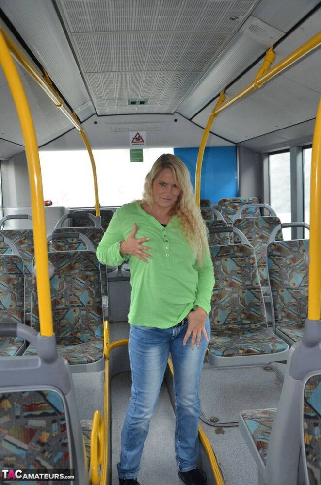 Blonde amateur Sweet Susi strips to her socks on a public bus | Photo: 1329394