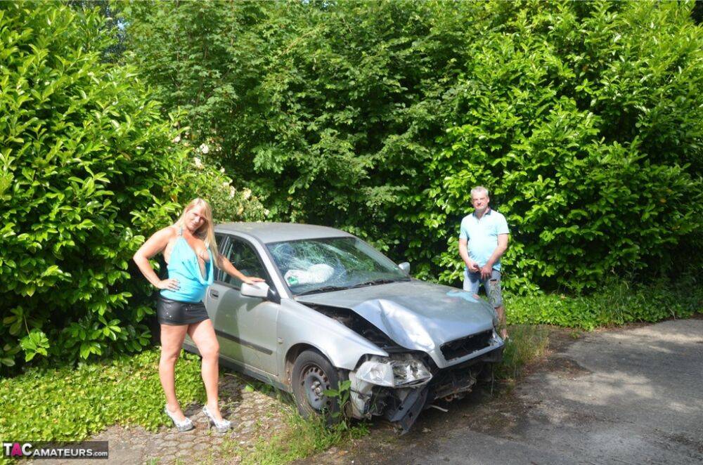 Older blonde Sweet Susi sucks a dick by a wrecked automobile in the backyard - #12