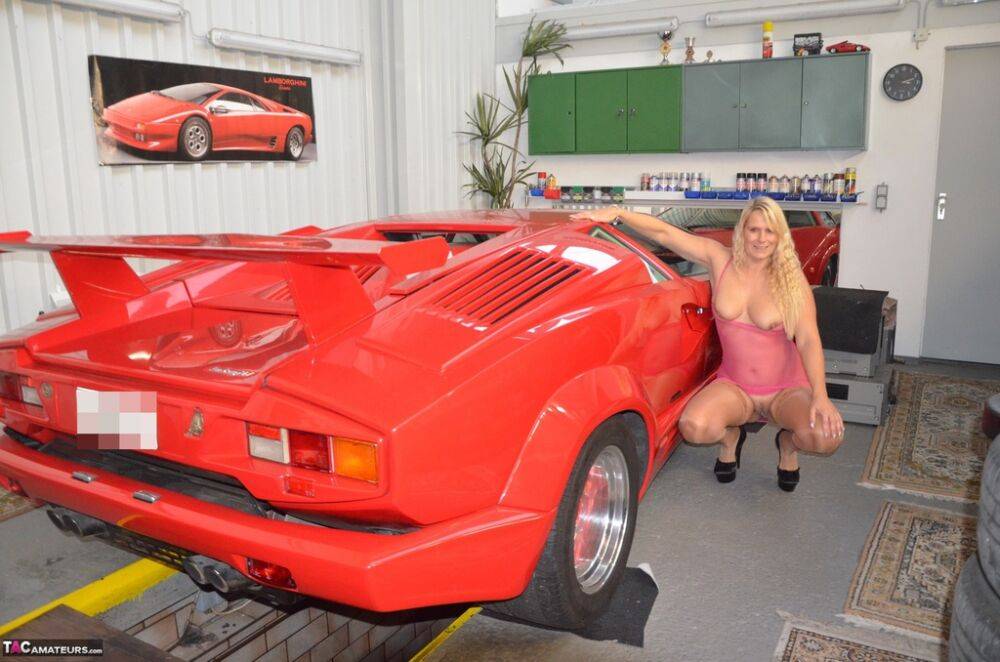 German MILF Sweet Susi exposes her tits in front of a Lamborghini - #10