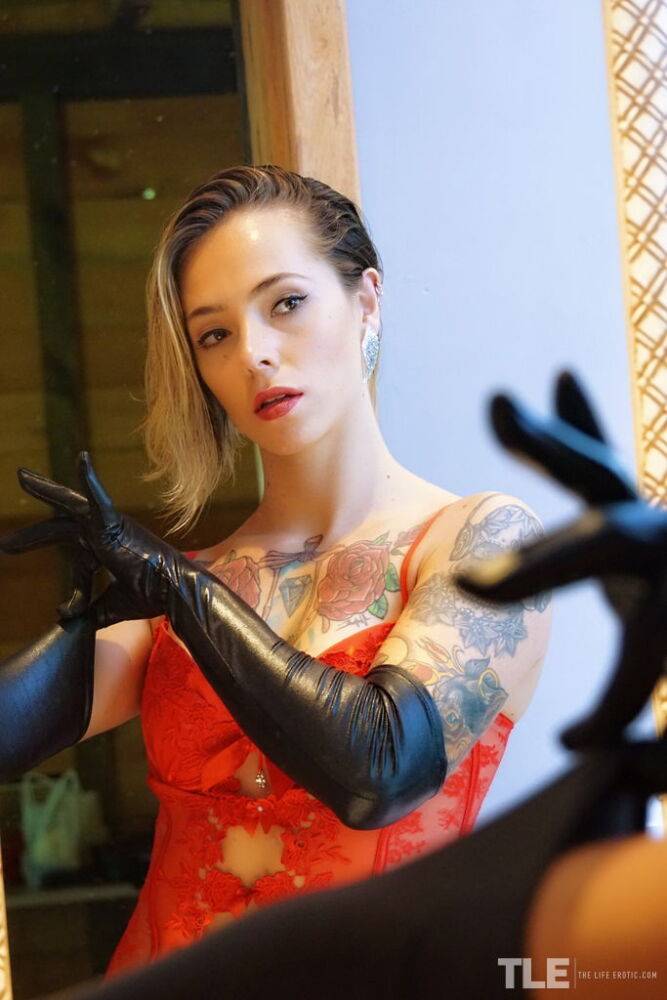 Tattooed teen dons a black latex glove before attending to her pink pussy - #5