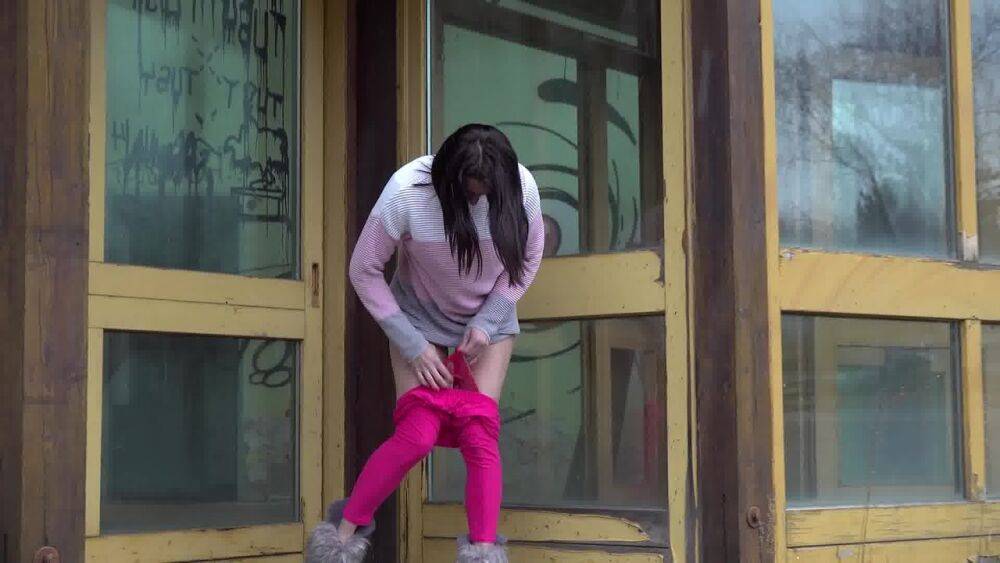 Short taken girl Victoria Daniels pees at a transit stop in pink tights & UGGs - #15