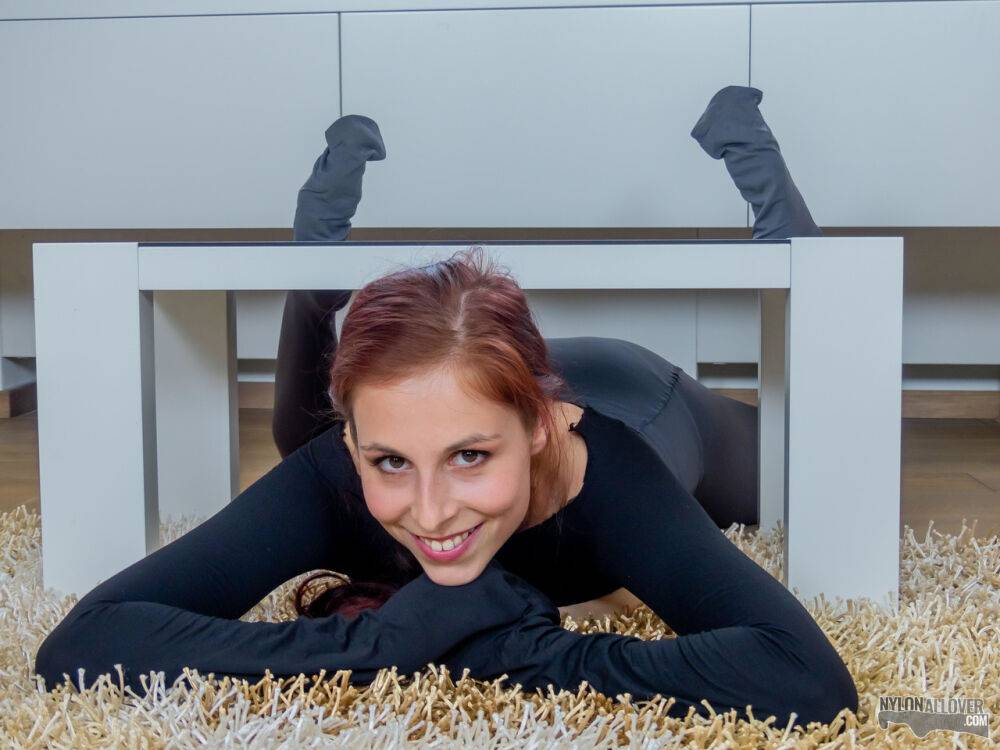 Sexy redhead Antonia Sainz shows her nice tits while wearing pantyhose | Photo: 1666737