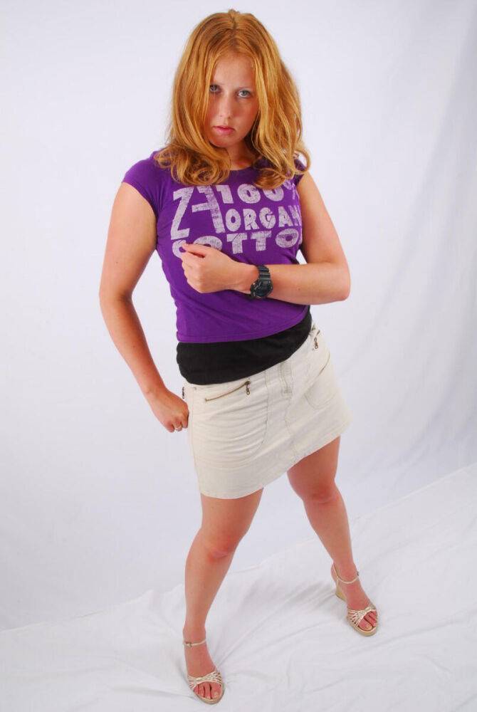 Natural redhead Judy models a black G-Shock watch while fully clothed - #2