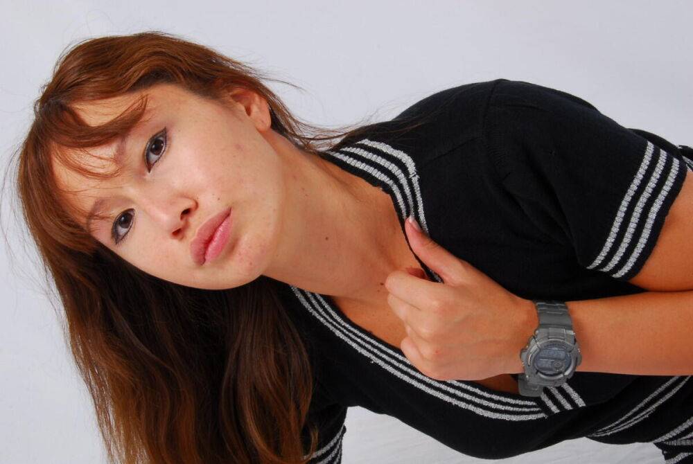 Asian redhead Evita models a grey G-Shock watch while fully clothed - #14