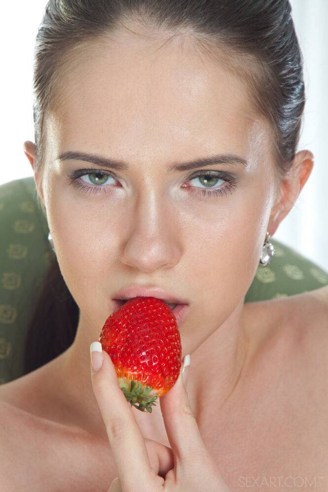 Naked teen Margo G slips a strawberry inside her edible pussy - #4