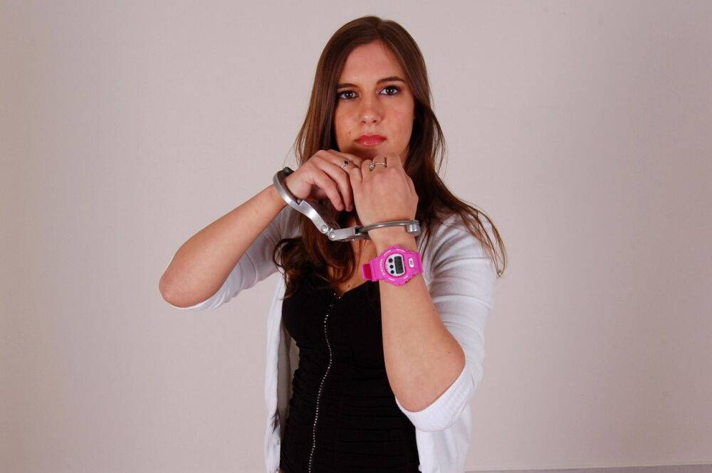 Redheaded amateur Stacey models a G-Shock watch and LIPS handcuffs in jeans - #11