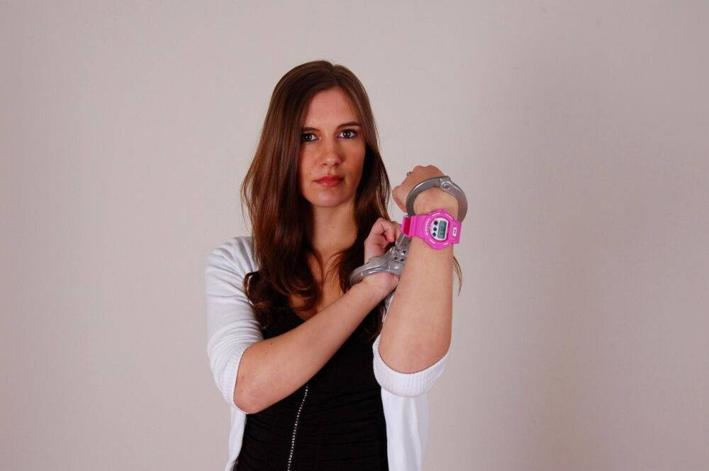 Redheaded amateur Stacey models a G-Shock watch and LIPS handcuffs in jeans - #8