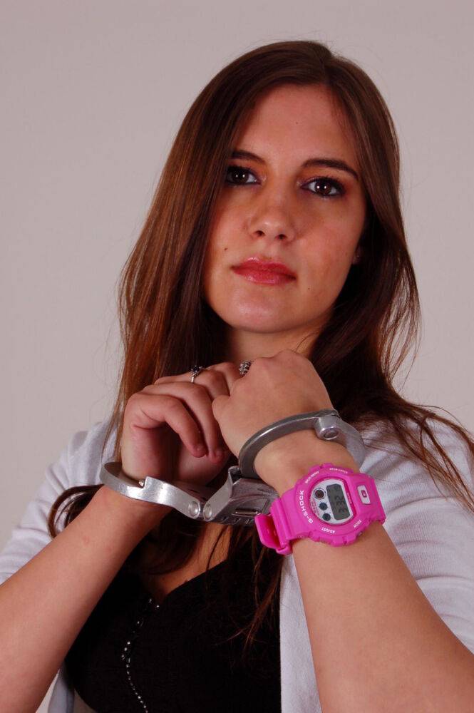 Redheaded amateur Stacey models a G-Shock watch and LIPS handcuffs in jeans - #4