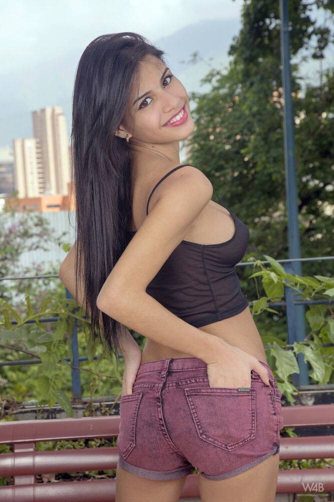 Pretty Latina model Denisse Gomez does a slow striptease on luxurious balcony - #6