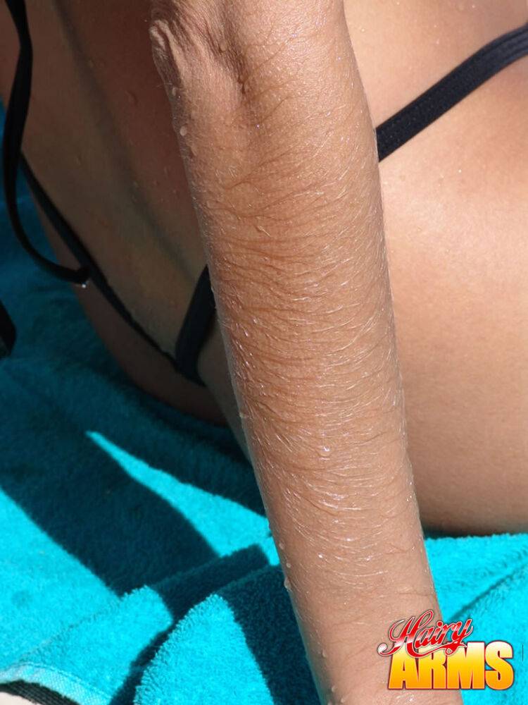 Amateur model Lori Anderson shows off her hairy arms in bikini and sunglasses - #2