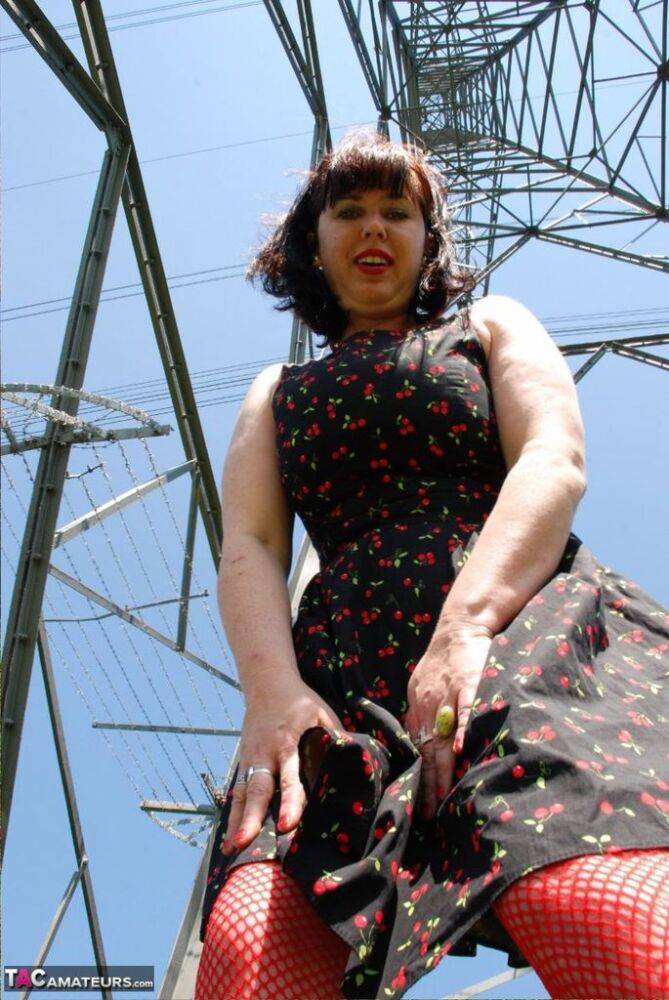 UK amateur Juicey Janey gets naked in heels underneath a hydro tower - #1