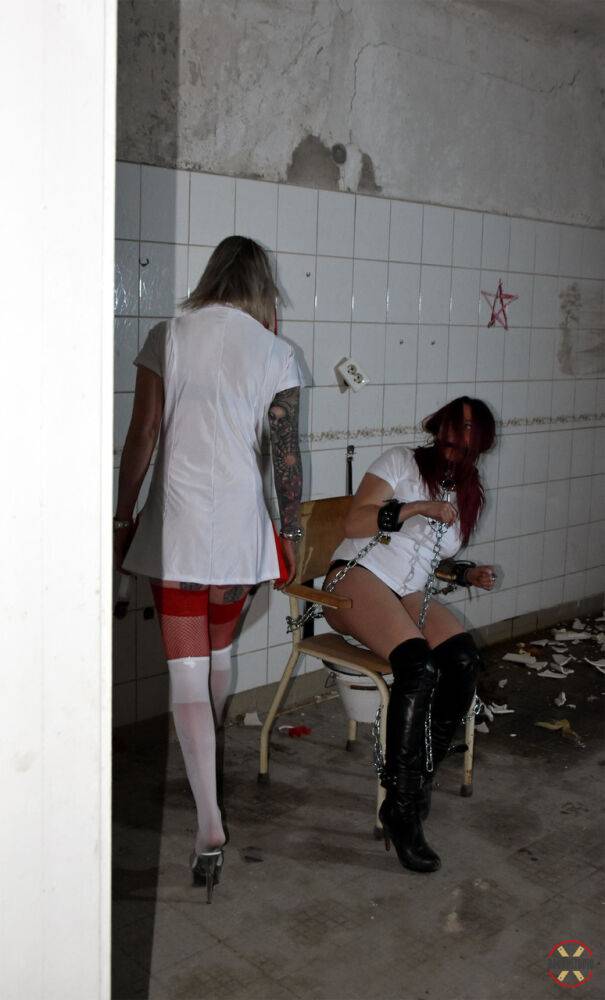 Platinum blonde nurse Roxxxi Manson gags a patient after chaining her - #5