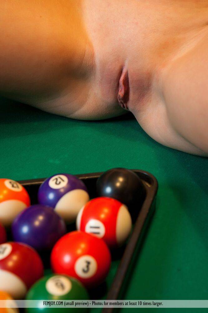 Tall teen Emilia D showcases her shaved pussy atop a pool table - #14