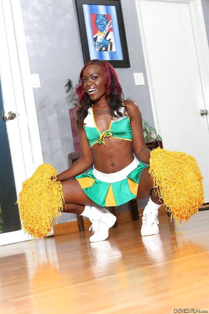 Black-skinned cheerleader Bella Doll is dancing naked on the camera - #3