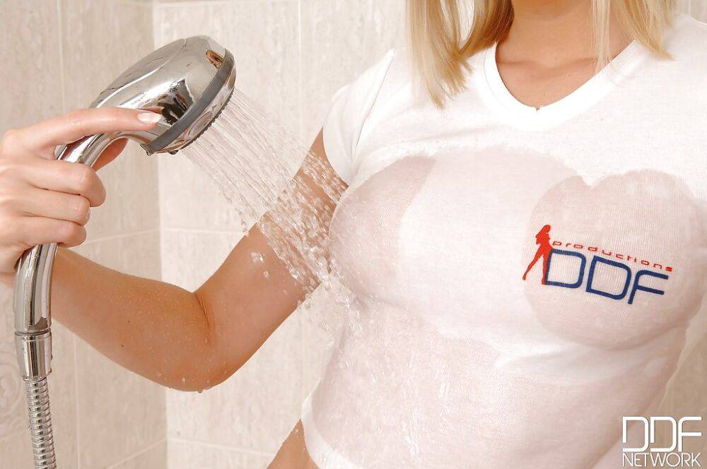 Sexy blonde babe Deni M and her nice tits get wet t-shirt treatment - #8